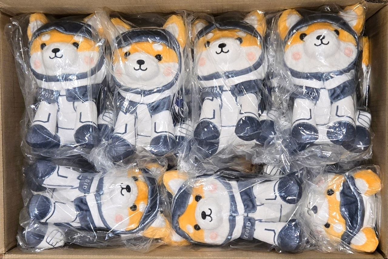 ASTEROID plushes on pallets, ready to ship